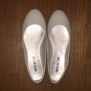 White ballet flats